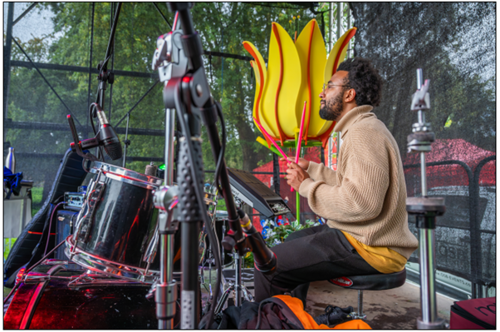 Person playing the drums