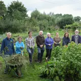 A group of gardeners on an allotment